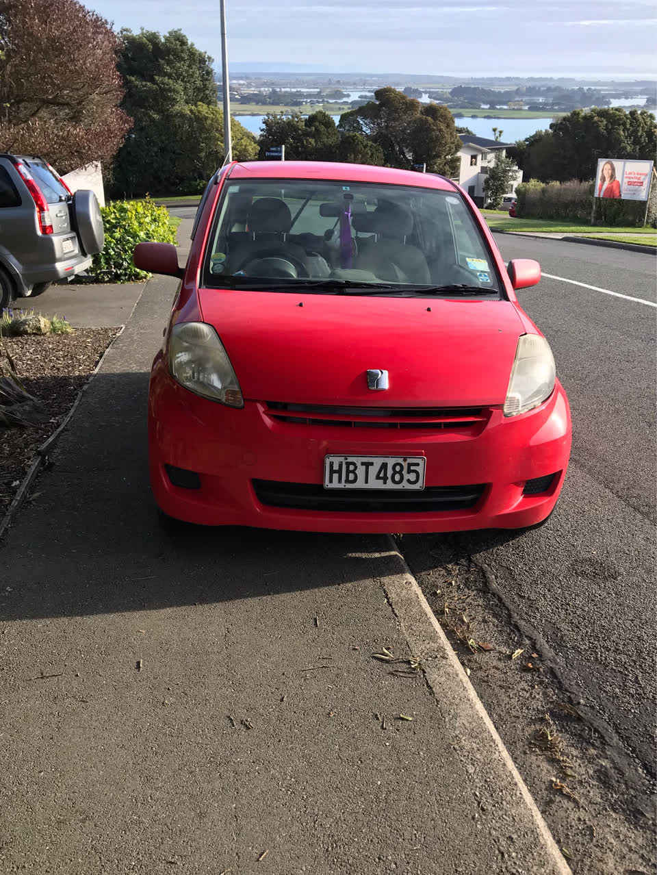 The photograph attached to this parking - illegal report