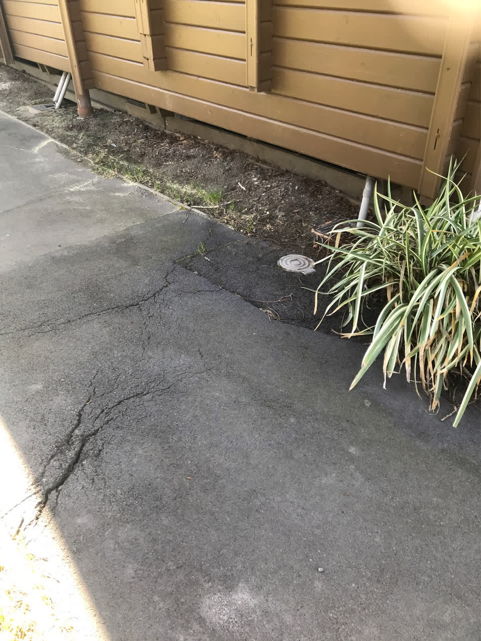 The photograph attached to this pavement - damaged report