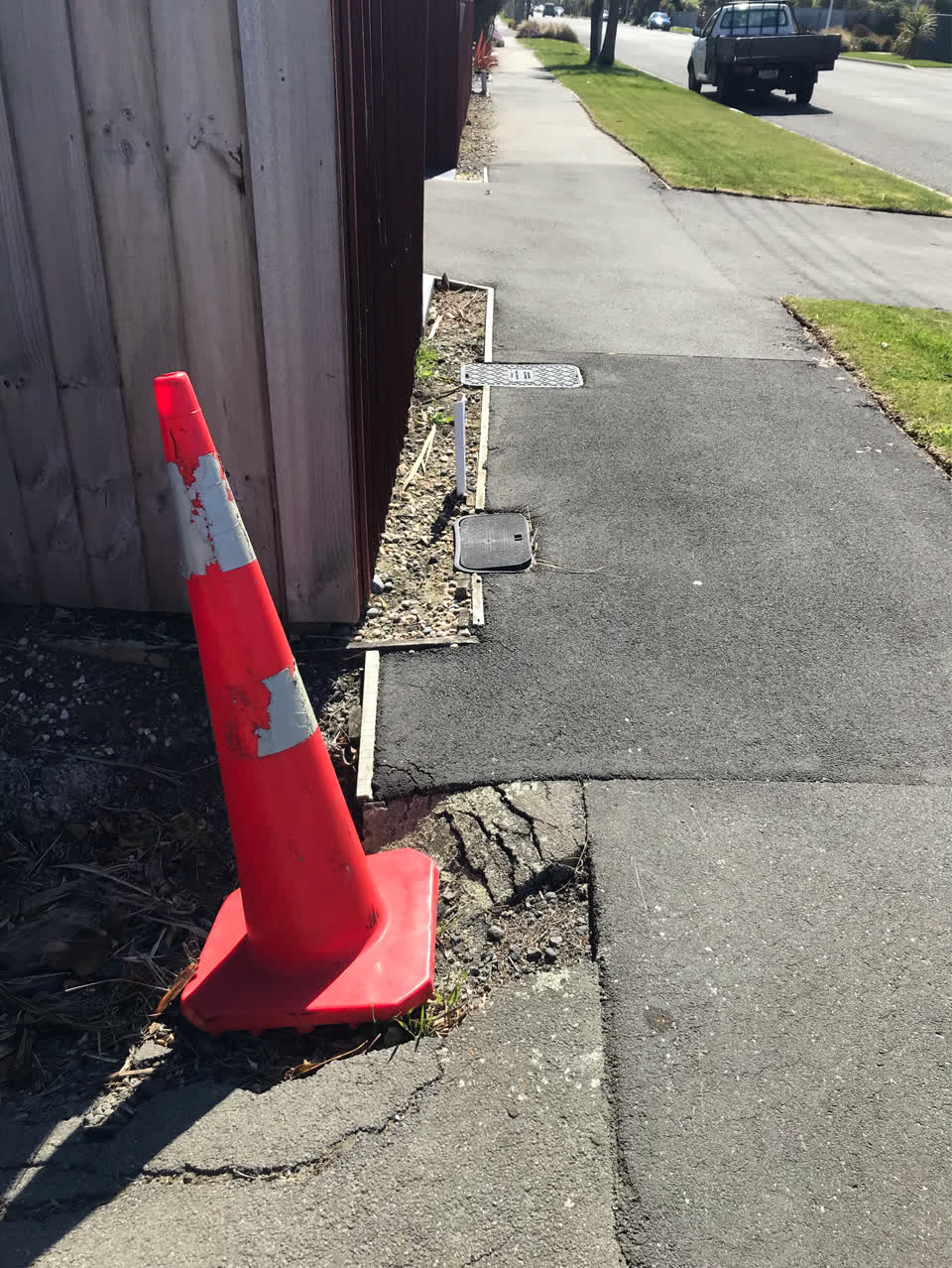 The photograph attached to this pavement - damaged report