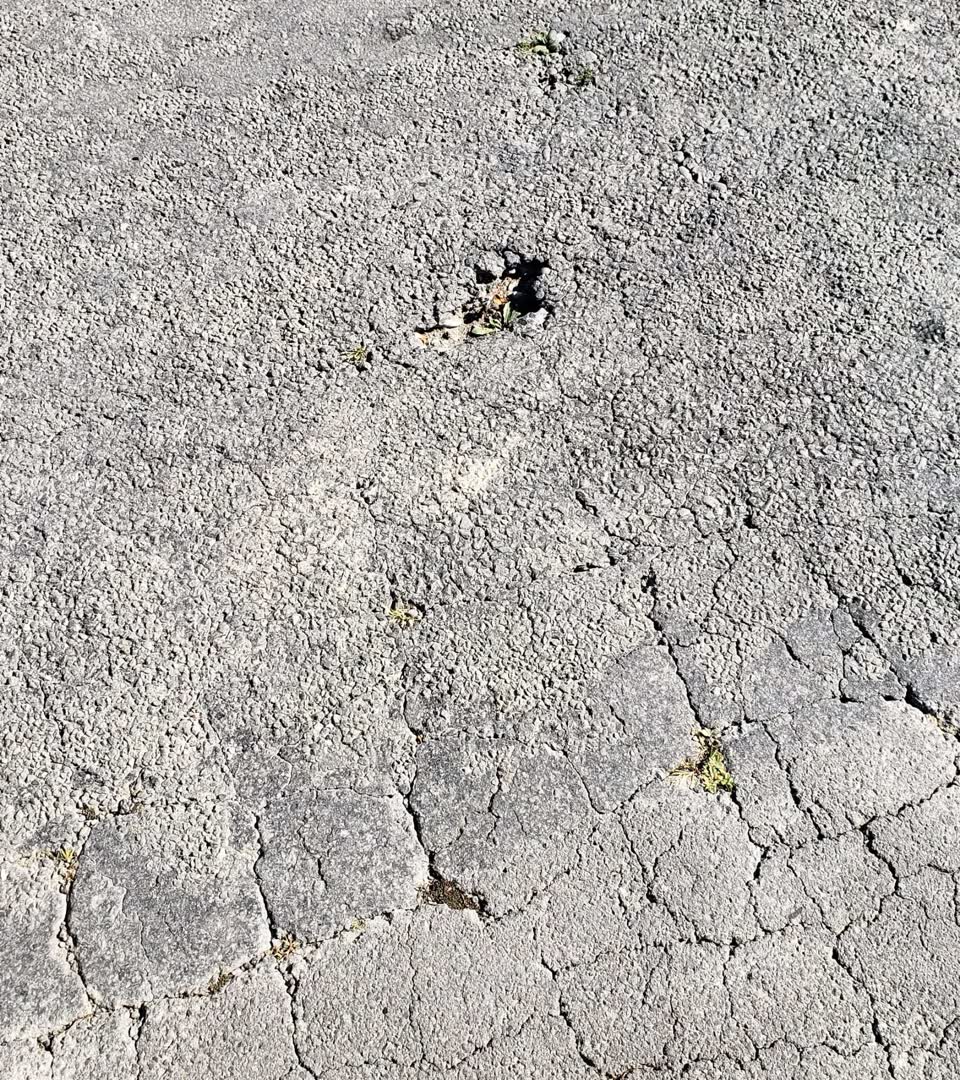 The photograph attached to this pothole report