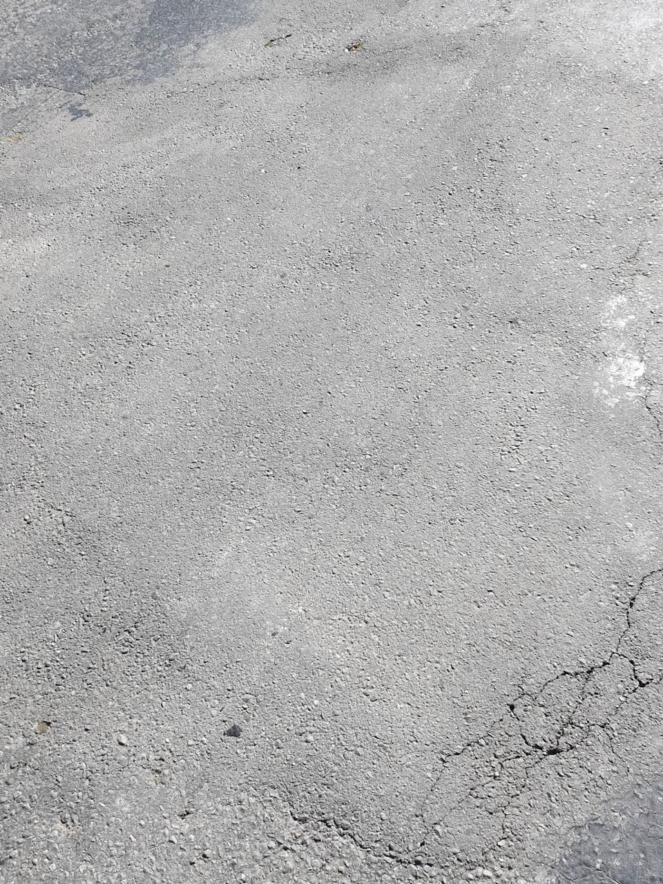 The photograph attached to this damaged road report