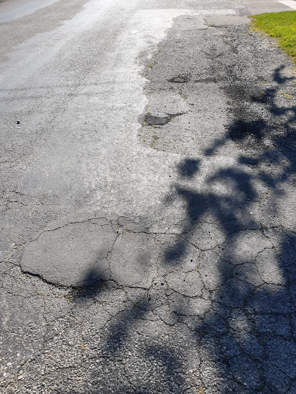 The photograph attached to this damaged road report
