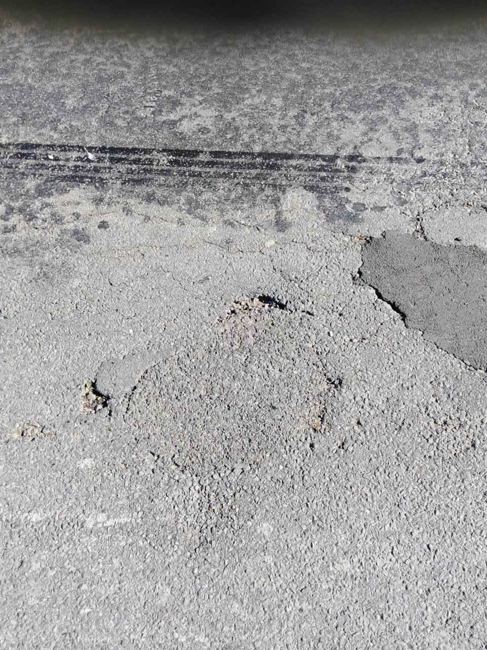 The photograph attached to this pothole report