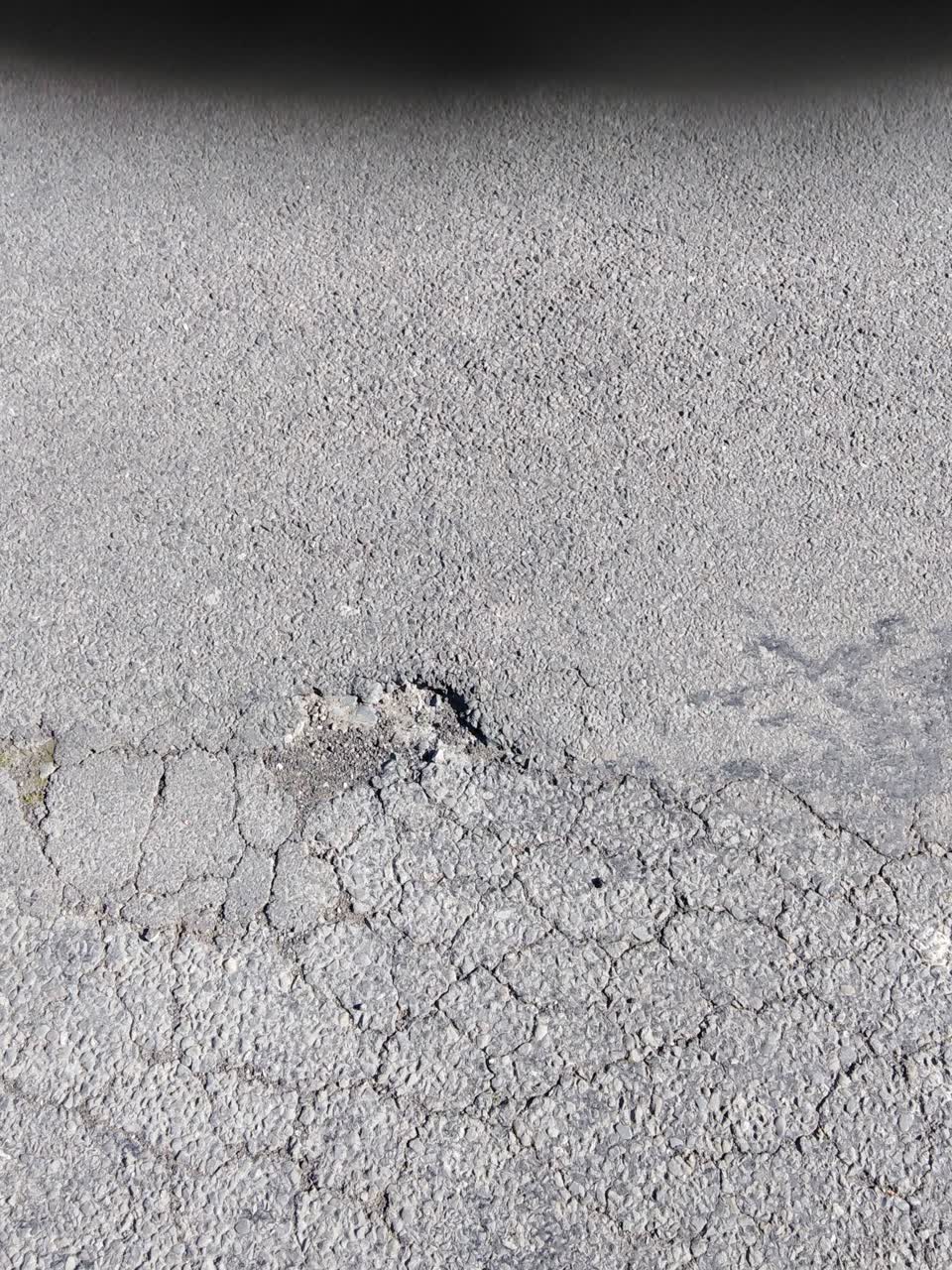 The photograph attached to this pothole report