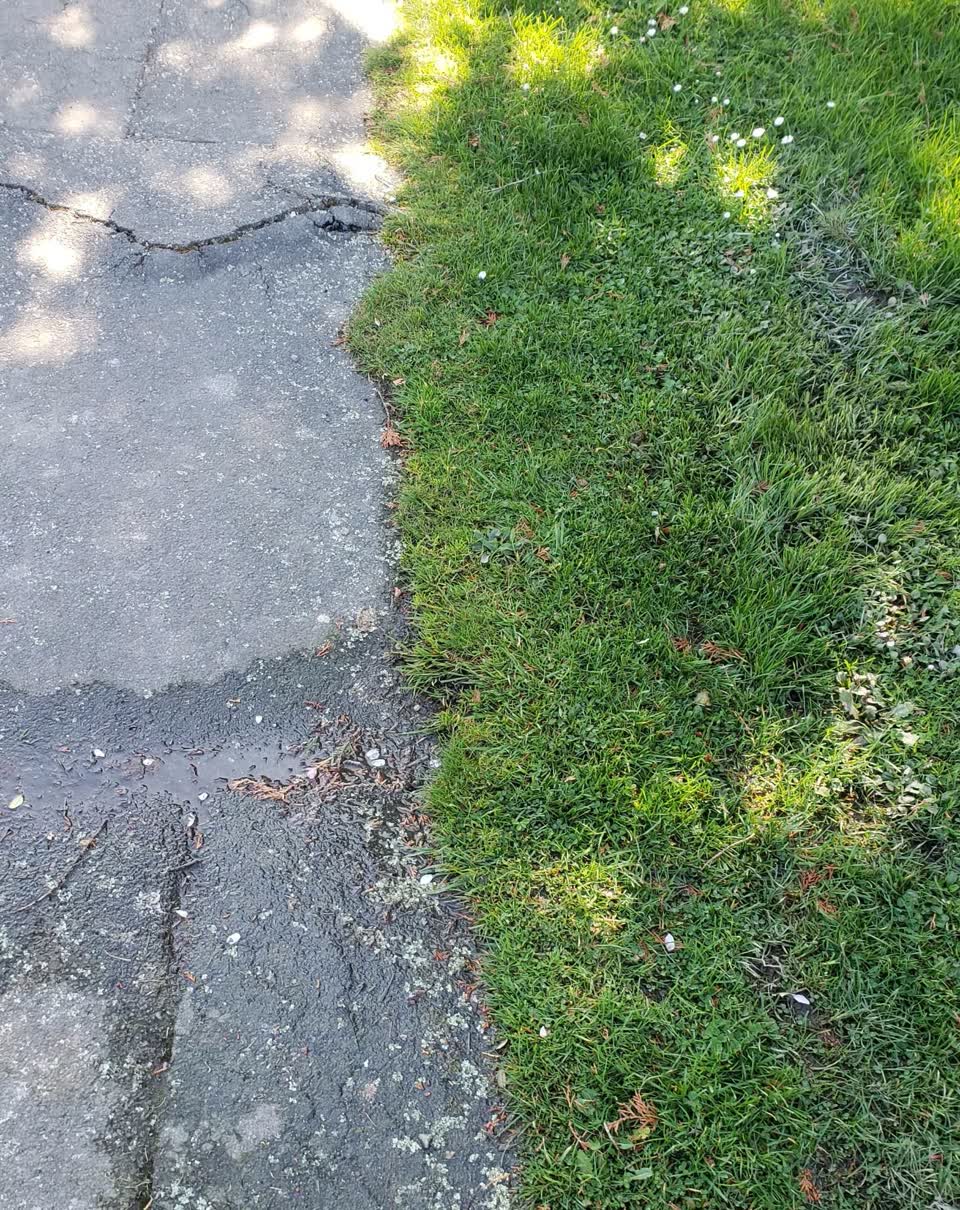 The photograph attached to this pavement - damaged report