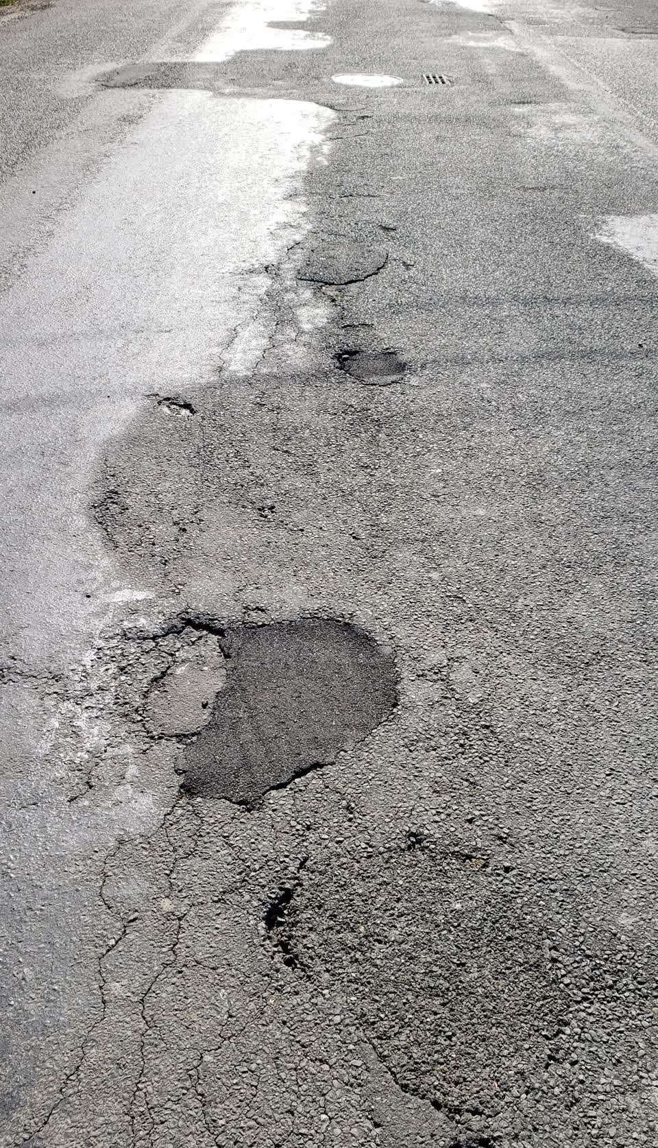 The photograph attached to this pothole report
