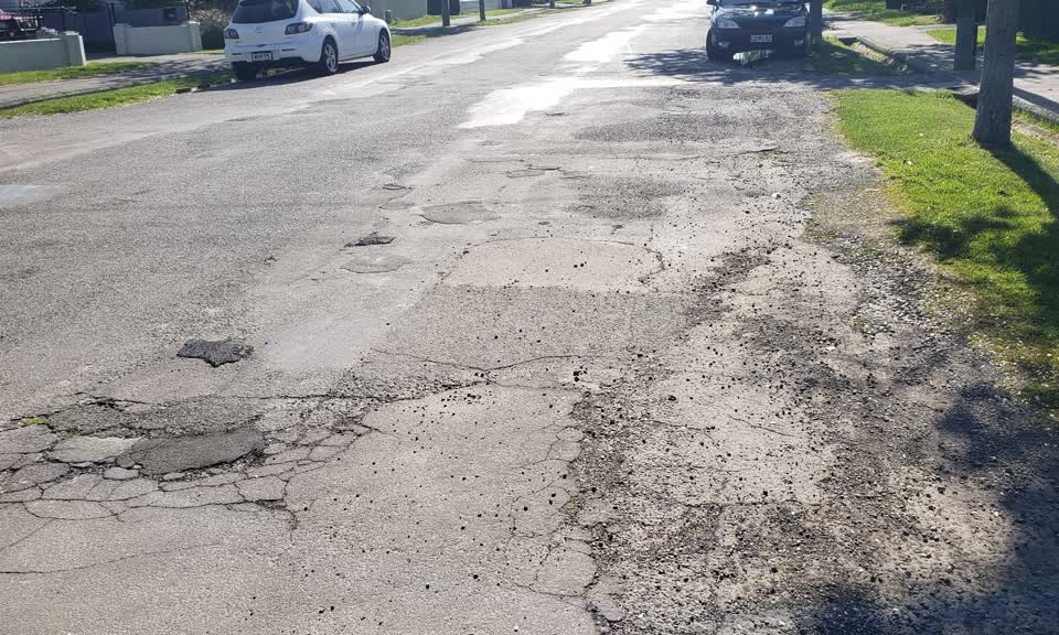The photograph attached to this damaged road report