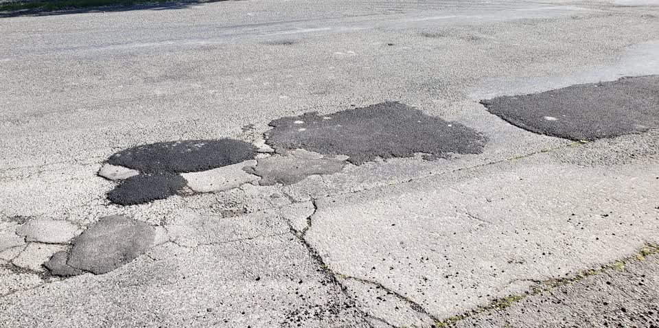 The photograph attached to this damaged road report