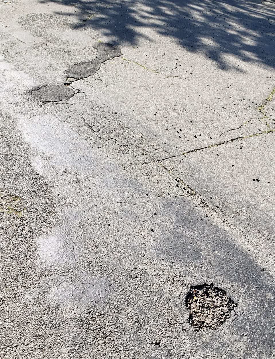 The photograph attached to this pothole report