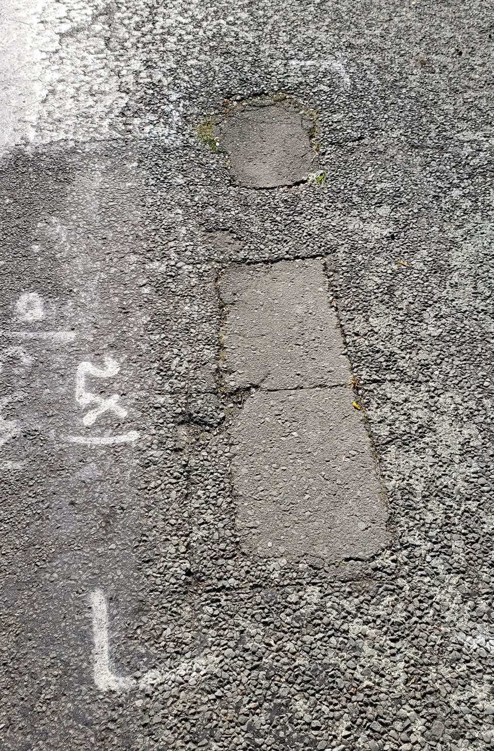 The photograph attached to this pothole report