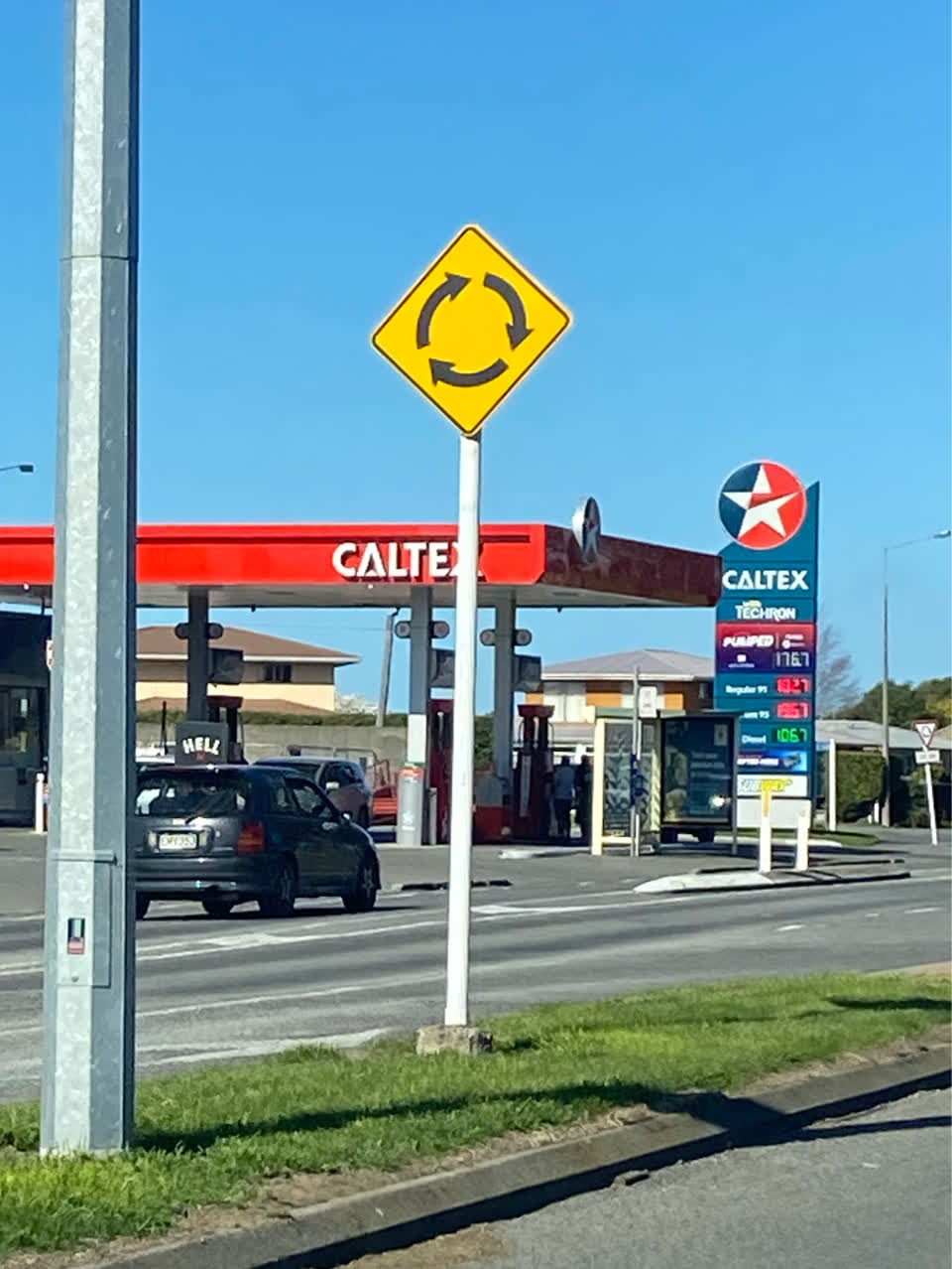 The photograph attached to this damaged street sign report