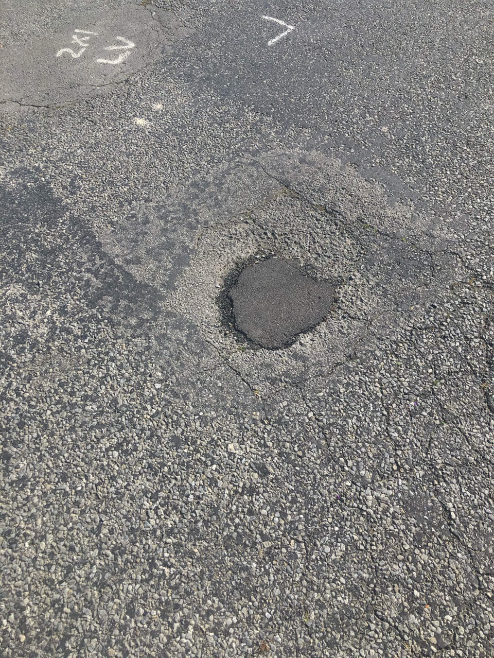 The photograph attached to this pothole report