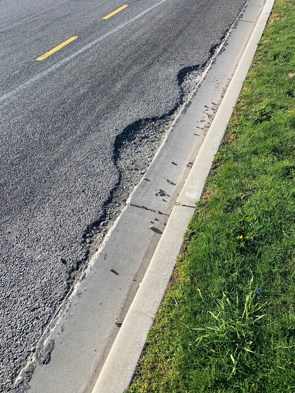 The photograph attached to this pothole report
