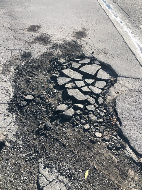 Pavement - Damaged, a report photo