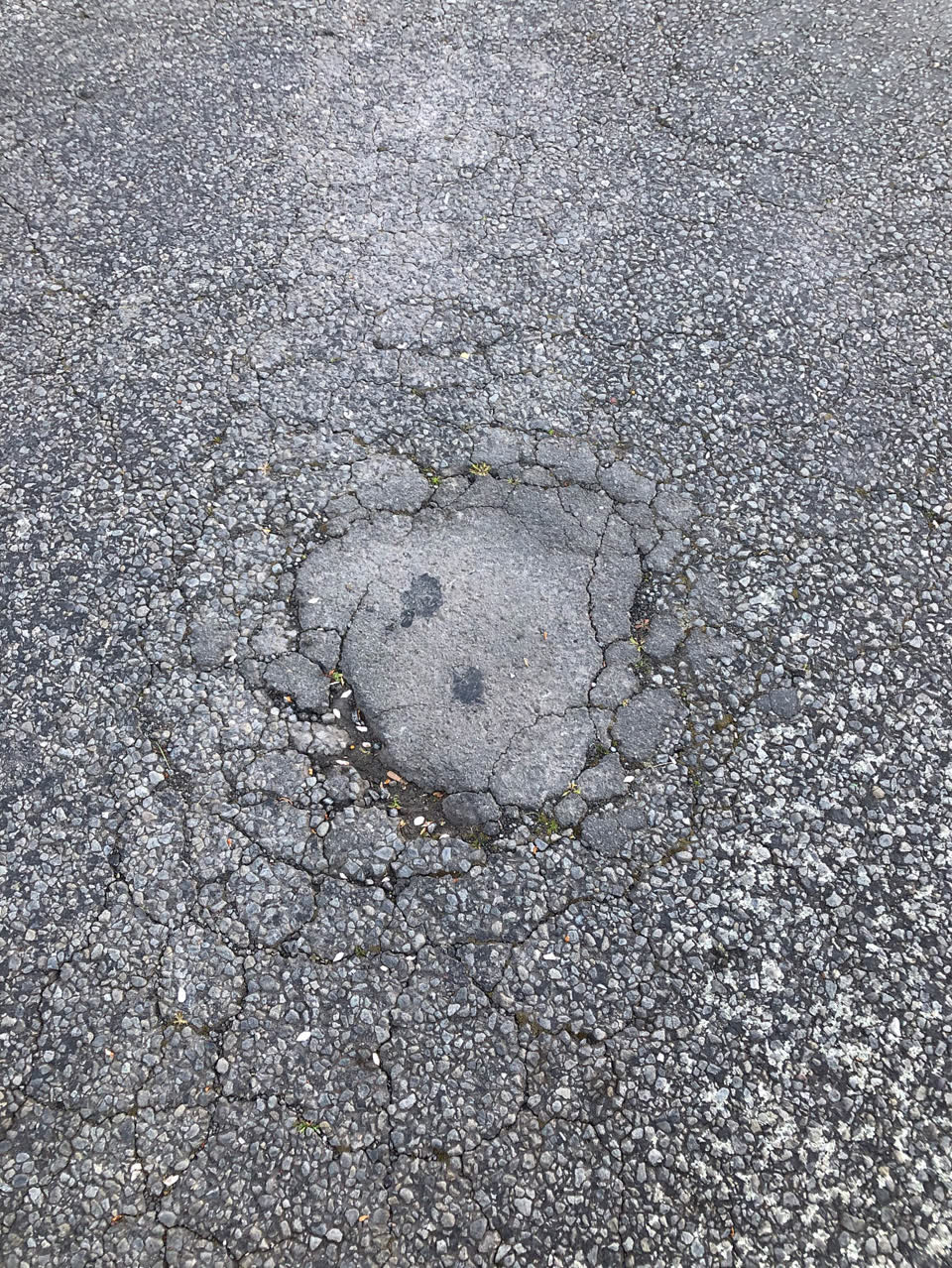 The photograph attached to this damaged road report