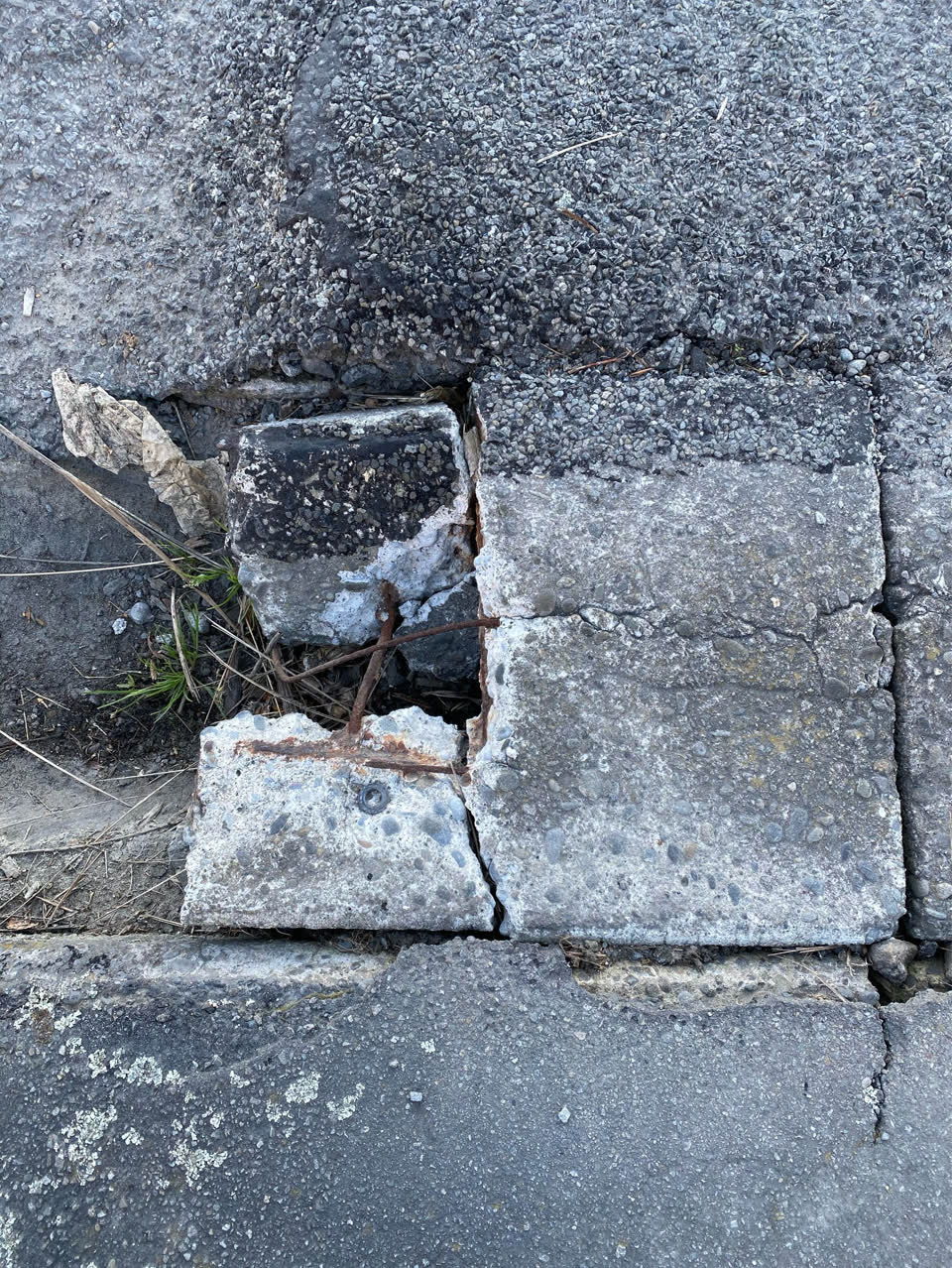 The photograph attached to this pavement - damaged report