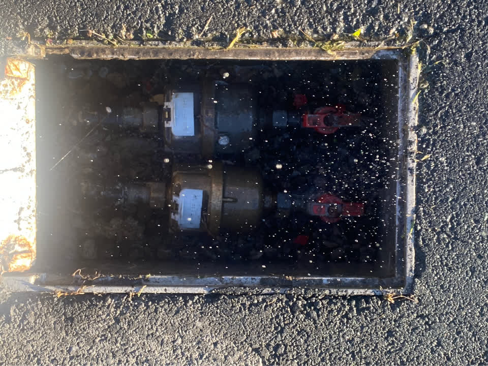 The photograph attached to this water leak report
