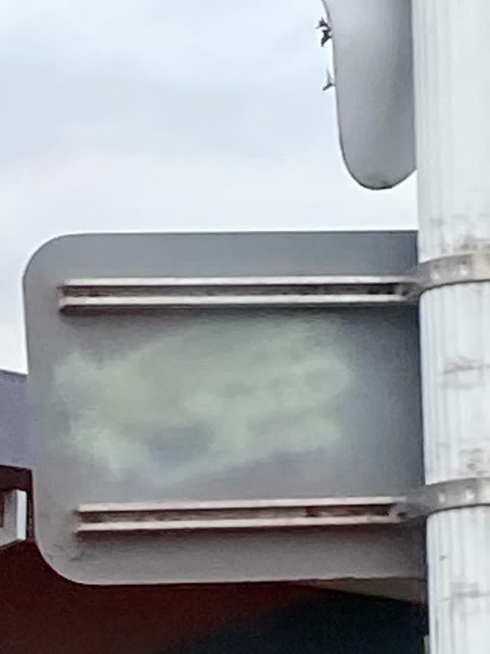 The photograph attached to this graffiti - signage report
