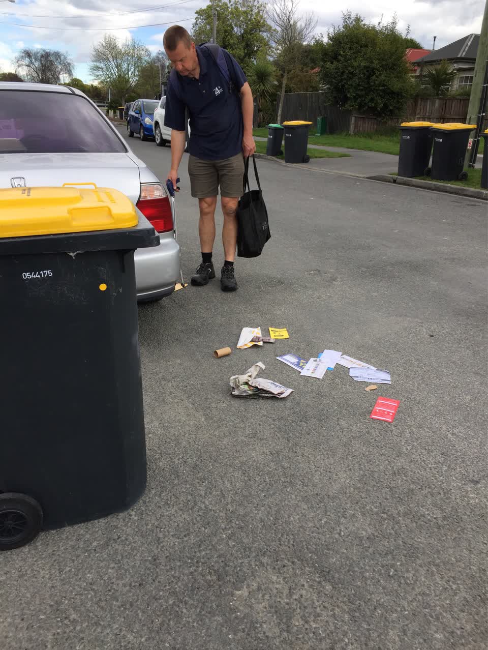The photograph attached to this rubbish and bins - general report