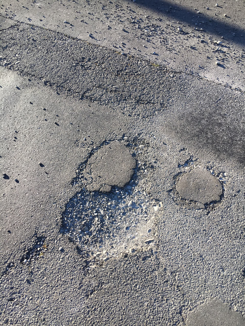 The photograph attached to this pothole report