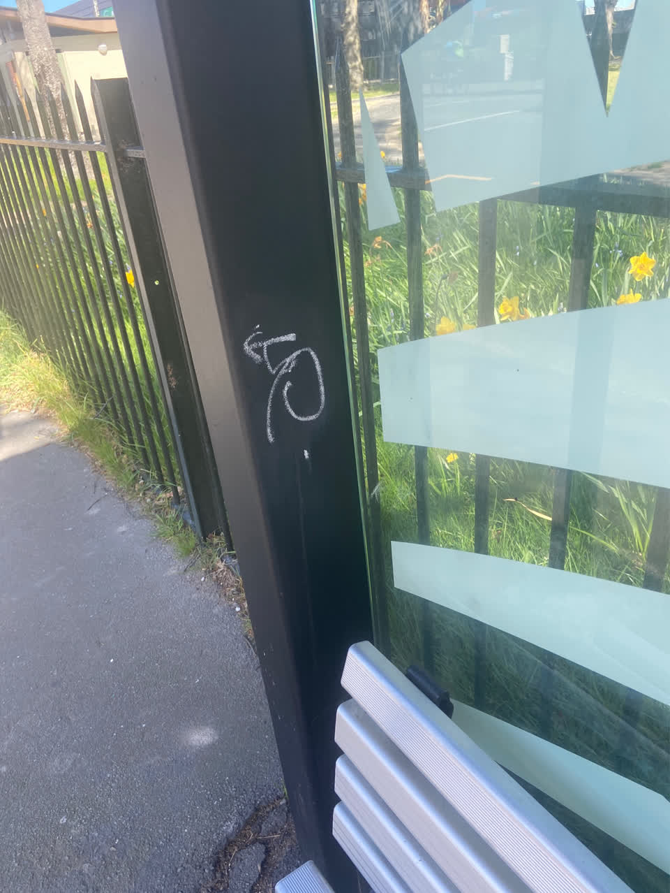 The photograph attached to this graffiti - public property report