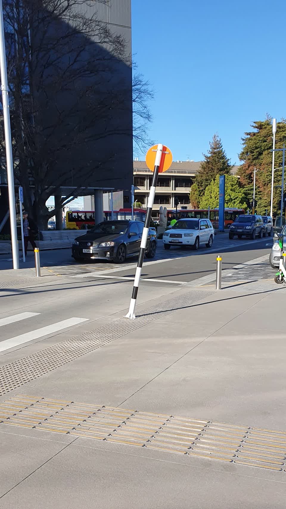 The photograph attached to this damaged street sign report