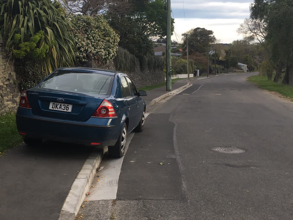 The photograph attached to this parking - illegal report