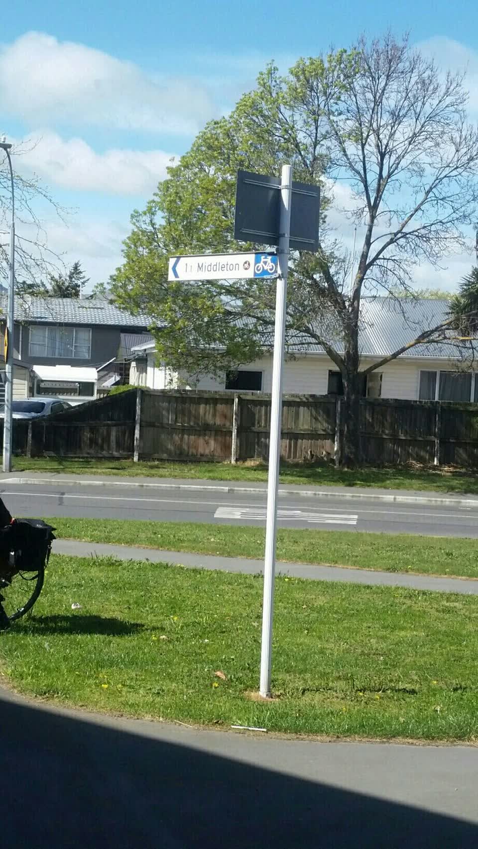 The photograph attached to this road signage report