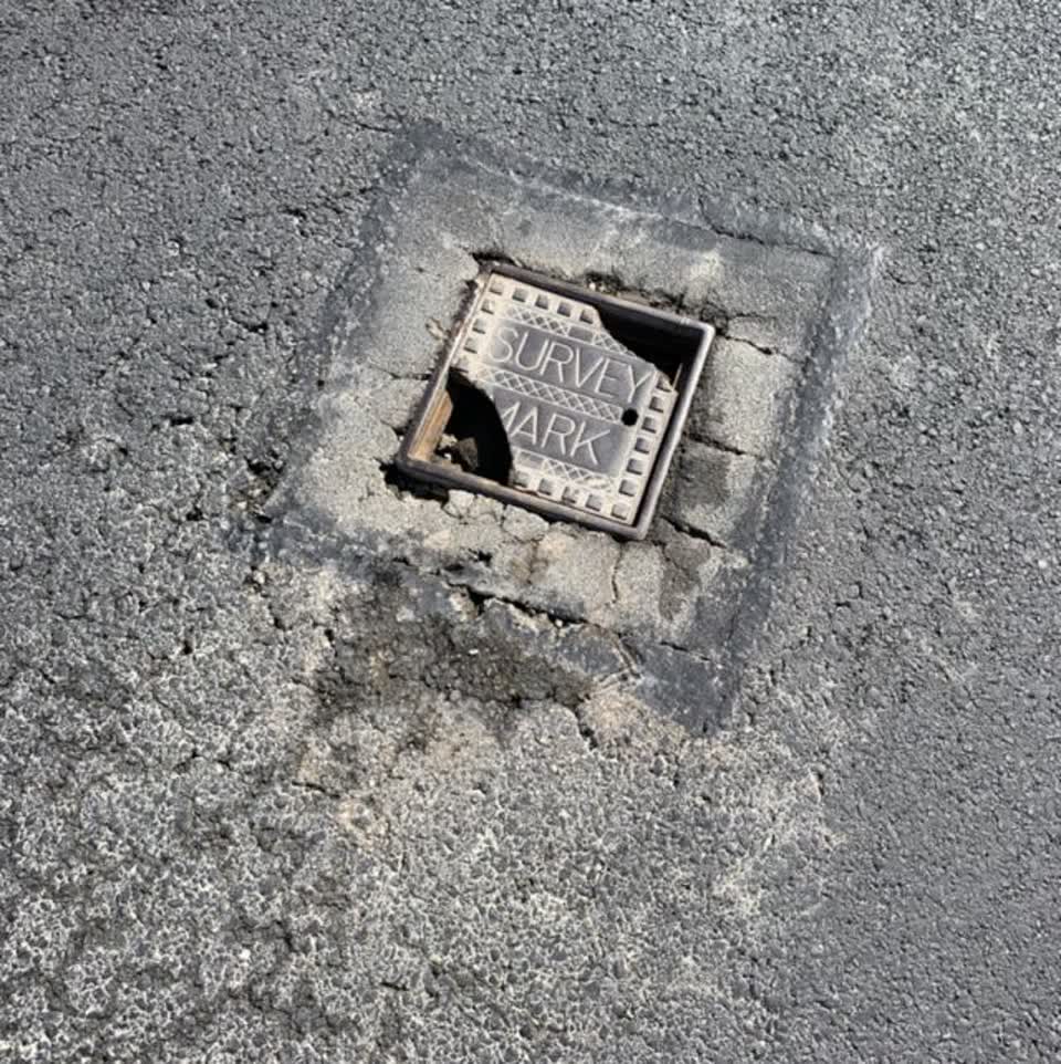 The photograph attached to this damaged road report