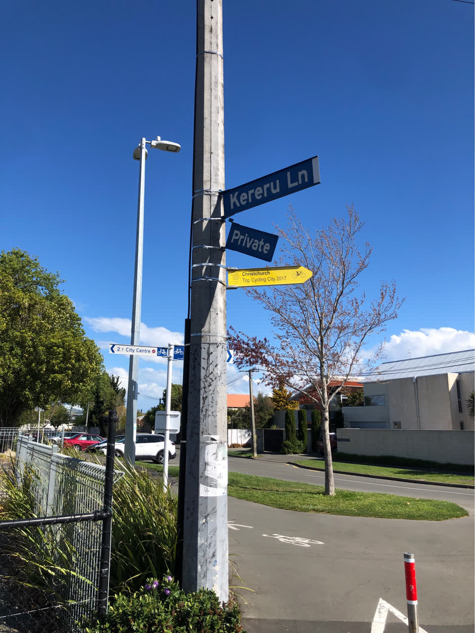 The photograph attached to this damaged street sign report