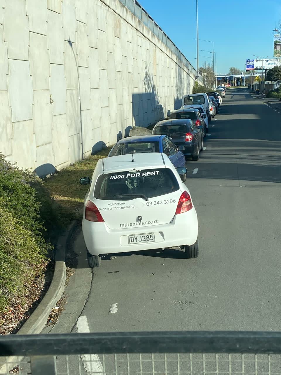 The photograph attached to this parking - illegal report