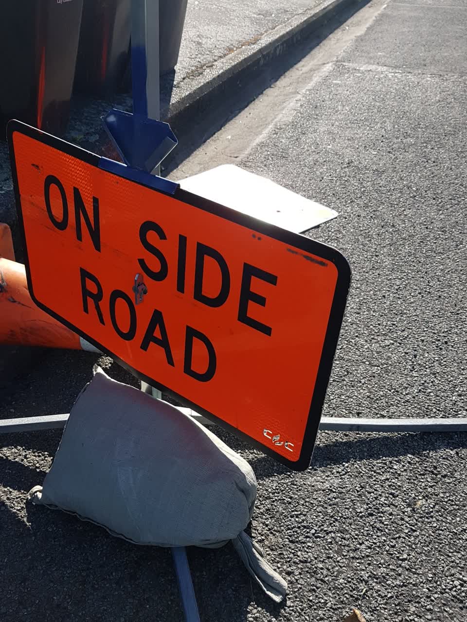 The photograph attached to this road signage report
