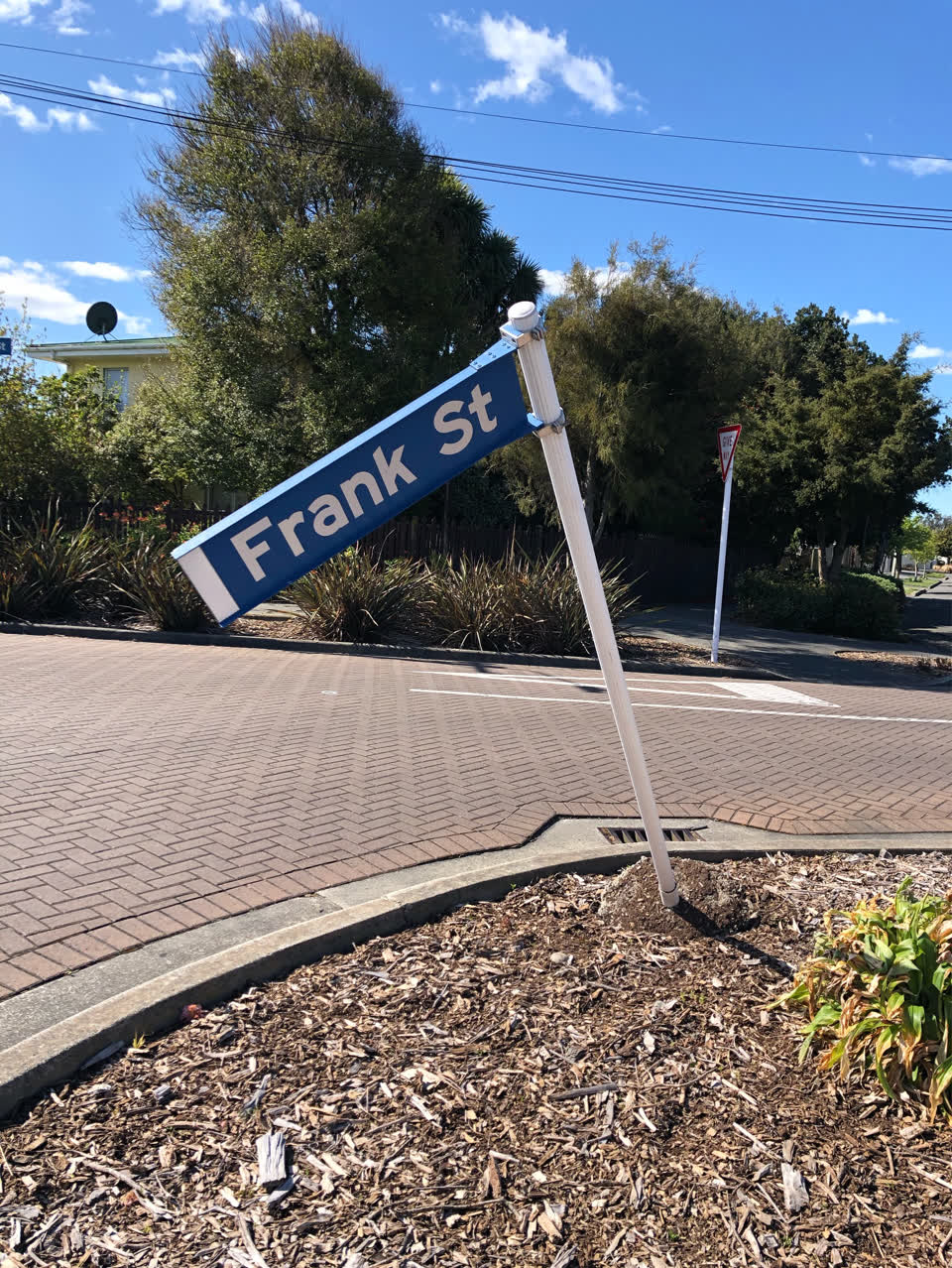 The photograph attached to this damaged street sign report