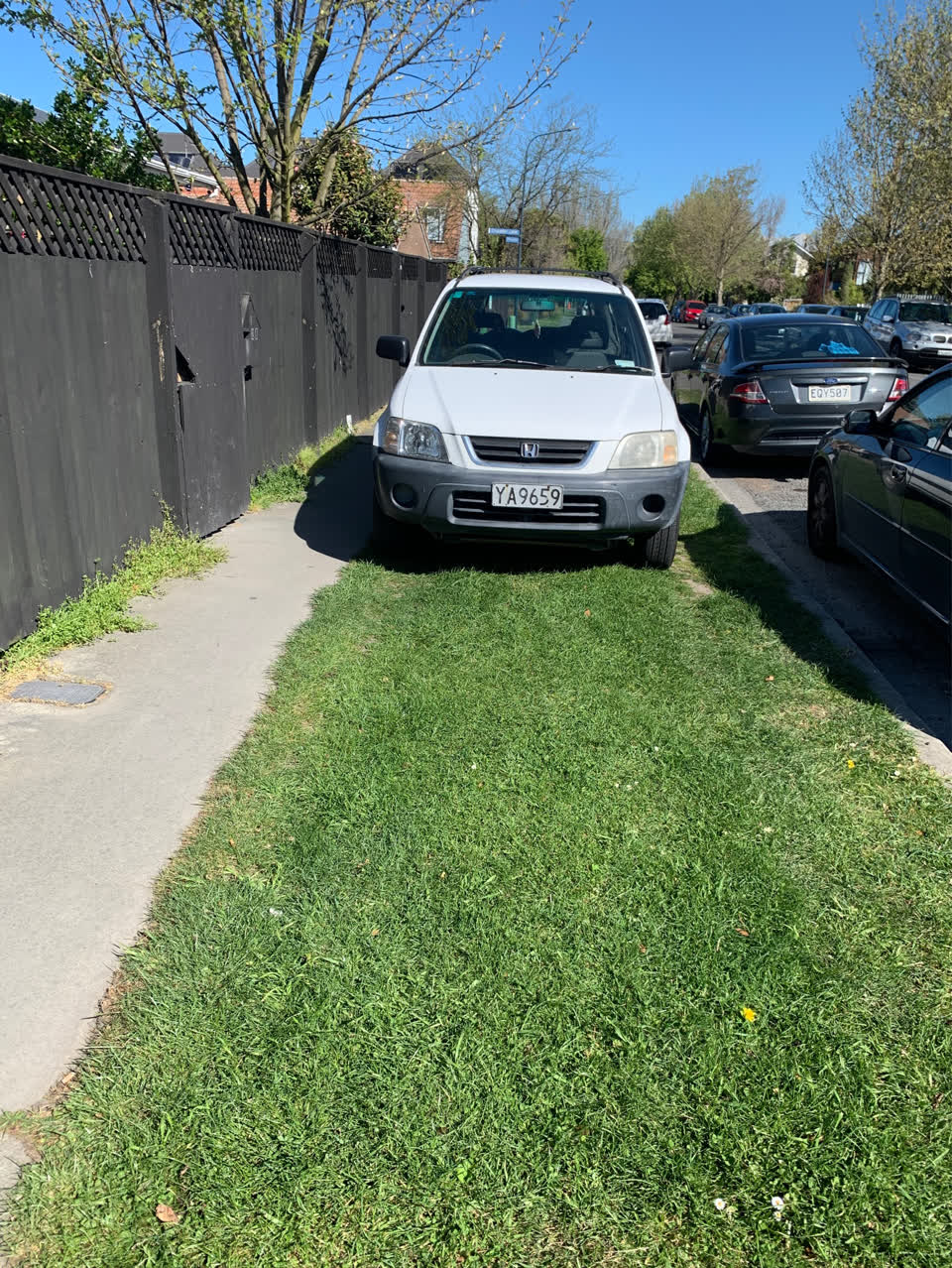 The photograph attached to this parking - illegal report