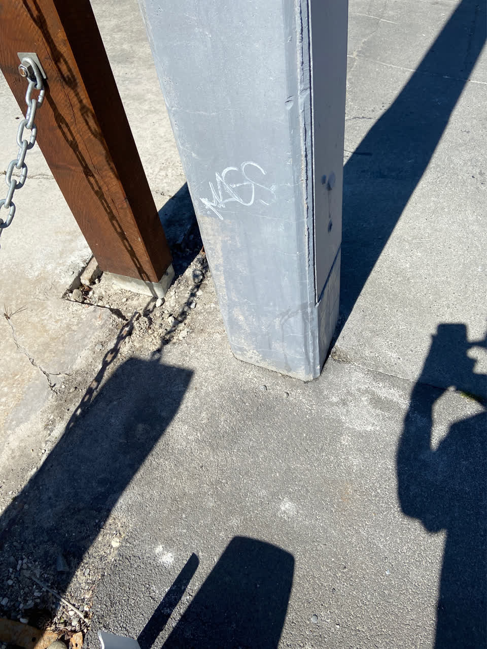 The photograph attached to this graffiti - concrete street light pole report
