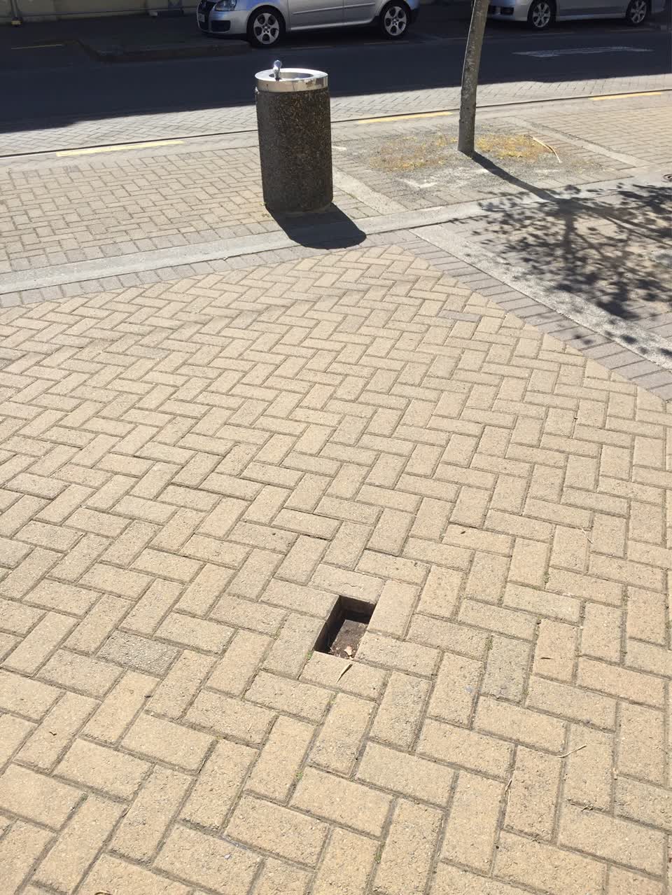The photograph attached to this pavement - damaged report
