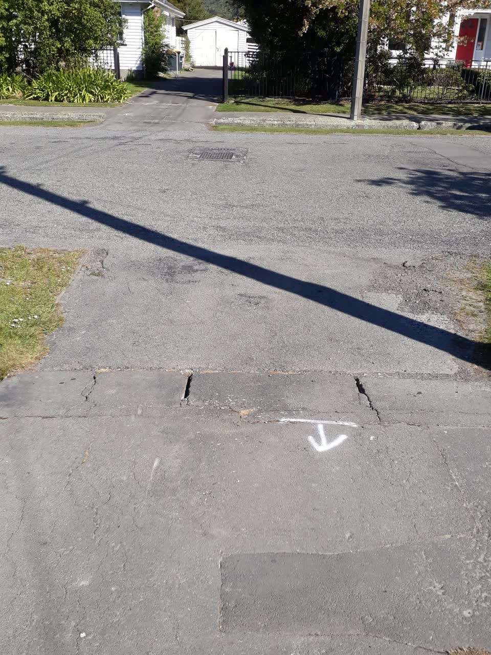 The photograph attached to this pavement - damaged report