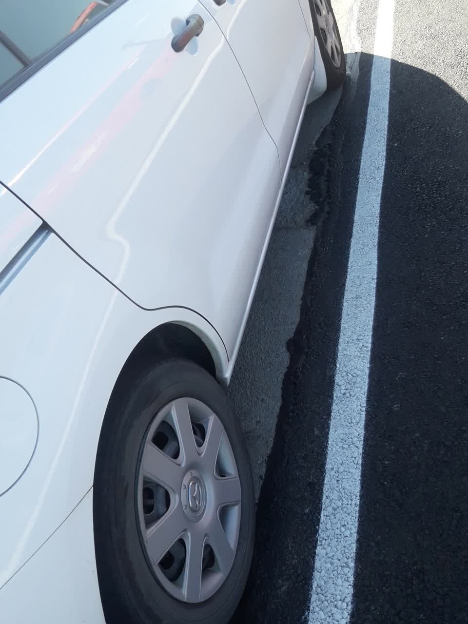 The photograph attached to this pothole report