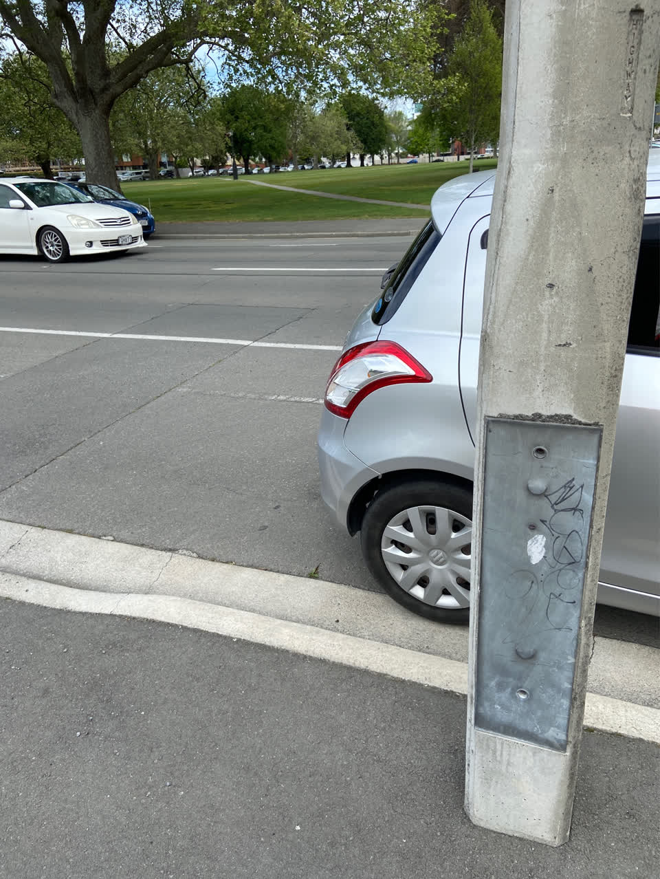 The photograph attached to this graffiti - concrete street light pole report