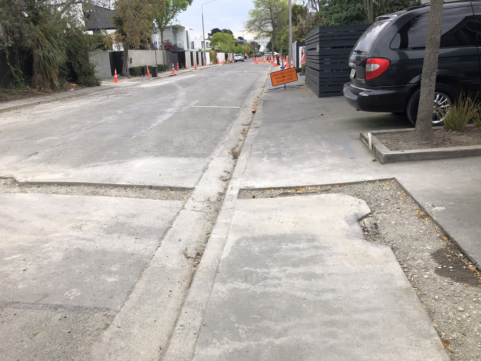 The photograph attached to this pavement - damaged report