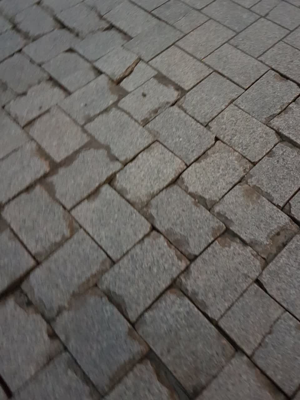 The photograph attached to this pavement - damaged report