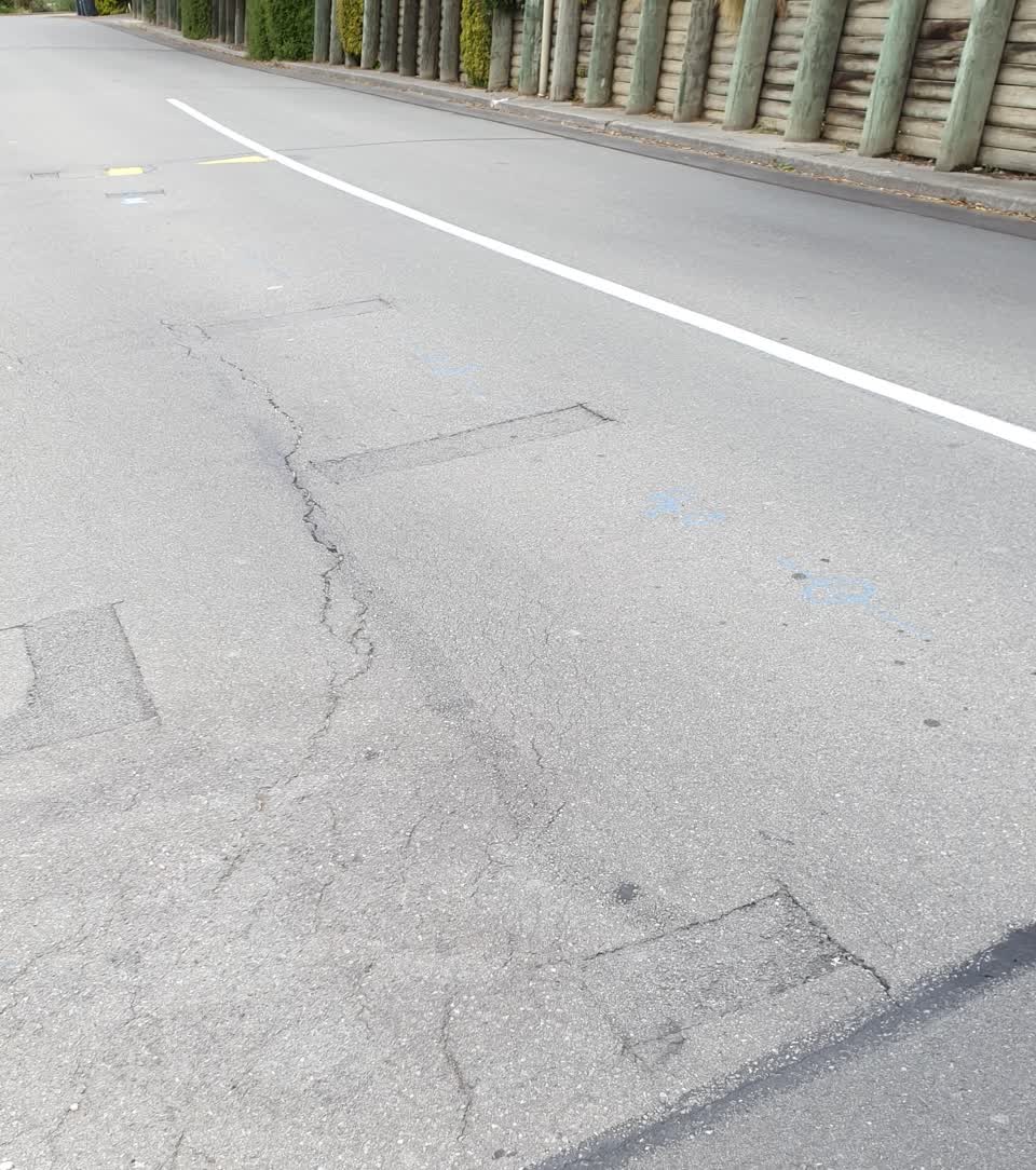 The photograph attached to this pothole report