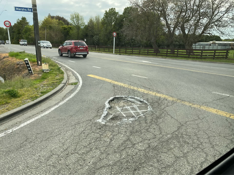 The photograph attached to this pothole report