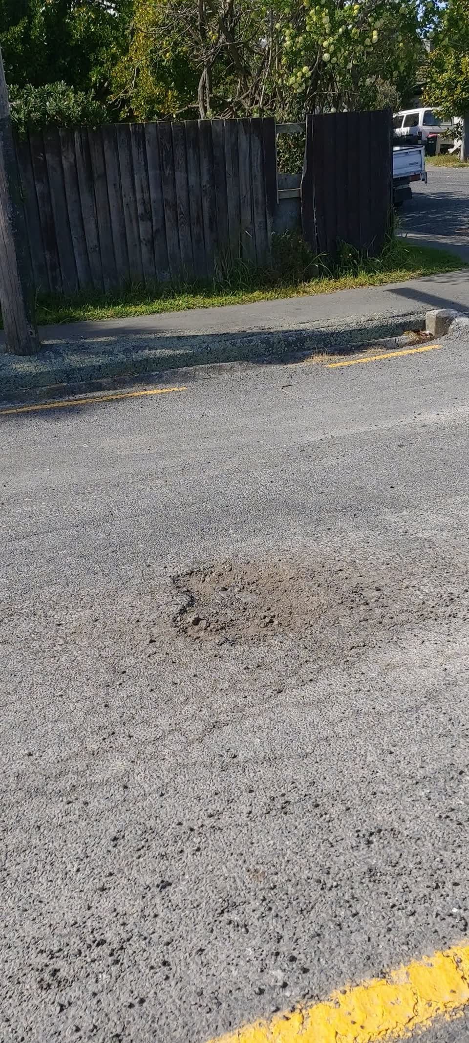 The photograph attached to this pothole report
