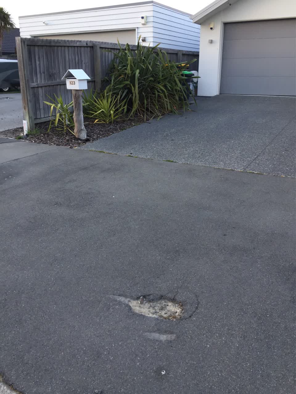 The photograph attached to this pothole report