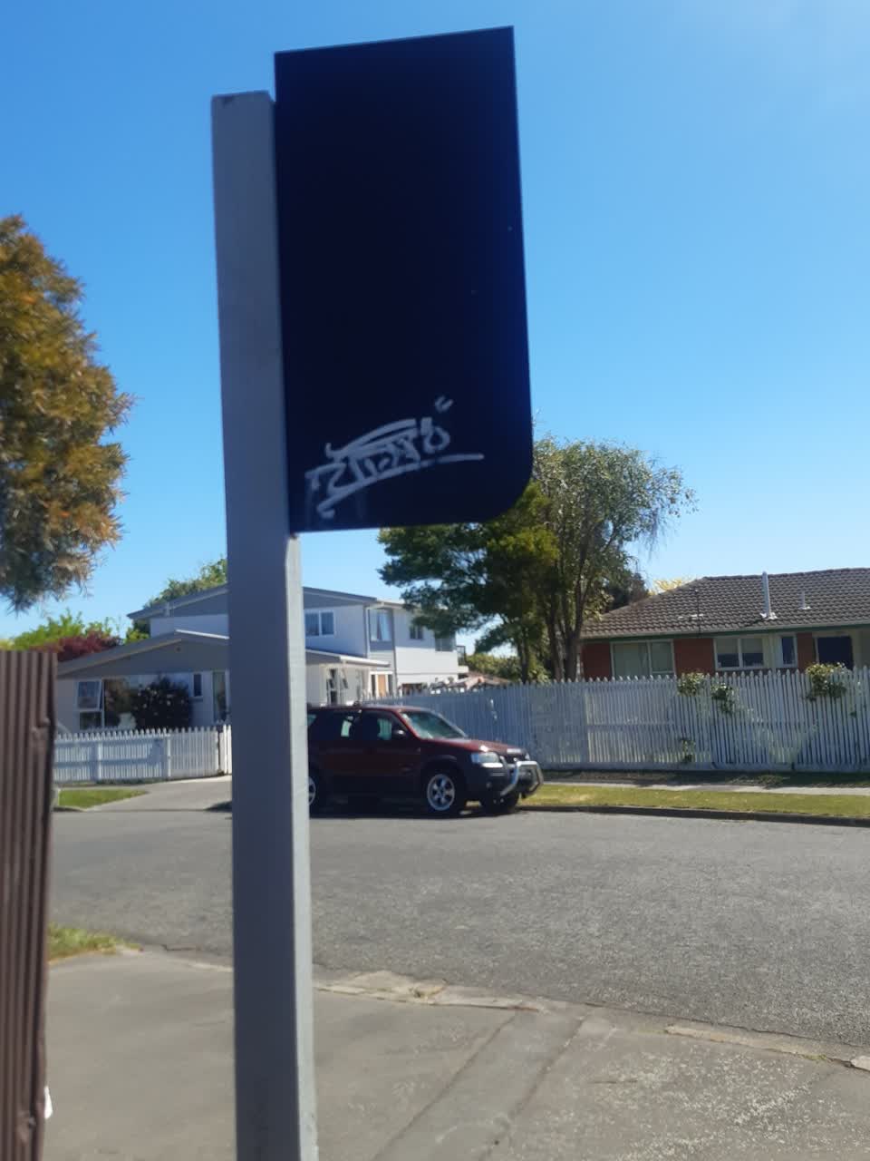 The photograph attached to this graffiti - signage report