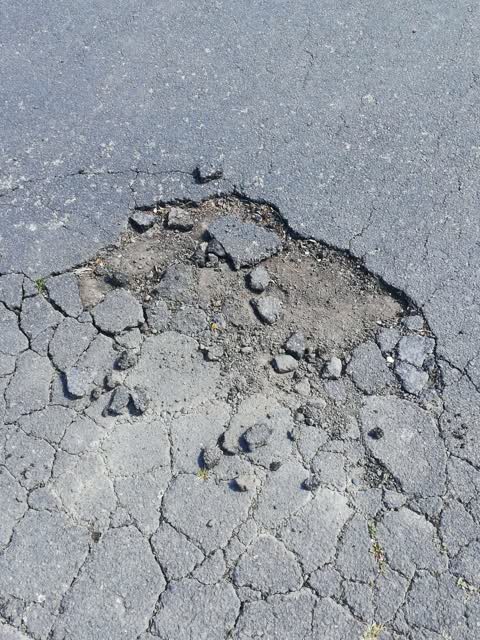 Pavement - Damaged, a report photo