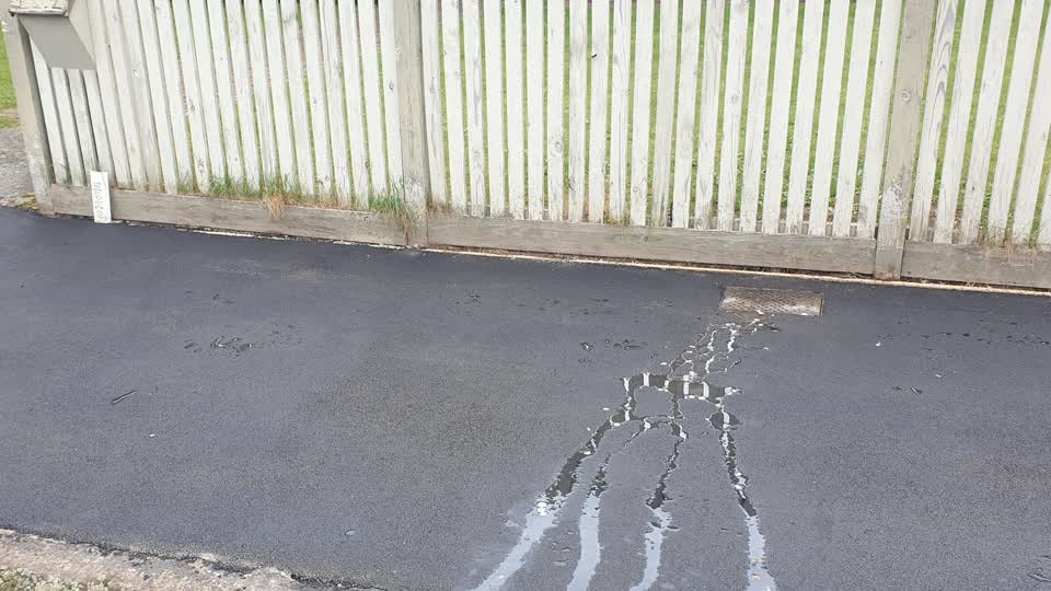 The photograph attached to this water leak report