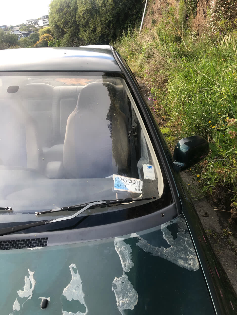 The photograph attached to this abandoned vehicle report