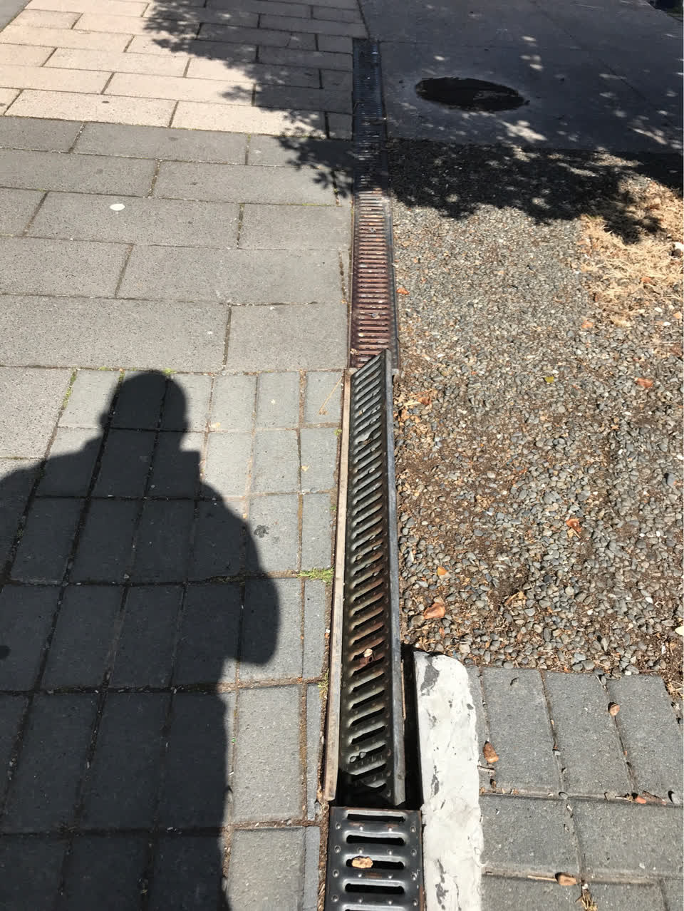 The photograph attached to this pavement - damaged report
